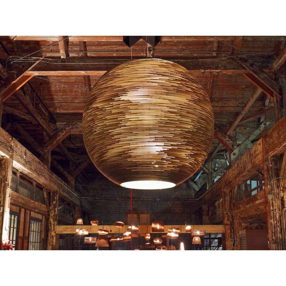 Pendant lamps made of recycled cardboard and clay - MaterialDistrict